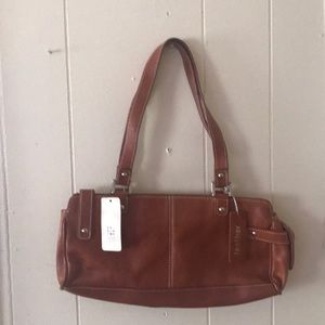 COPY - Rust colored leather bag.